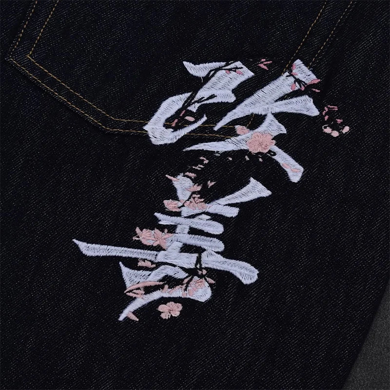 بنطلون جينز فضفاض واسع بنمط أحرف صينية باللون الأبيض بجيوب وبنطلون جينز مستقيم الساق داكن اللون للرجال والنساء بتصميم كلاسيكي غير رسمي مناسب للشارع